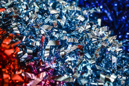 Confetti. Festive ornament, a decor from new years rain. Birthday. Background or texture.