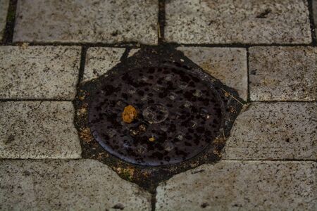 Background or texture from a broken and equal tile with patches of light and drops. Stone blocks on...