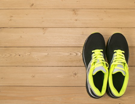 Sports accessories for fitness on the wooden floor. Healthy lifestyle concept.の写真素材