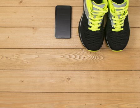 Sports accessories for fitness on the wooden floor. Healthy lifestyle concept.