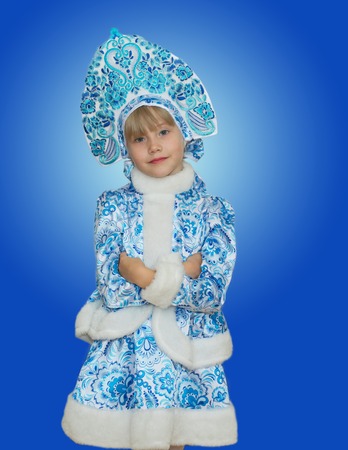 beautiful little girl in suit Snow Maiden. New Year and Christmas.の写真素材