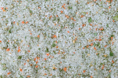 Background of a large sea salt with spices. Universal set of spices for cooking.の写真素材