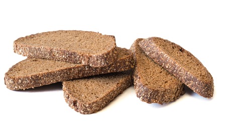 Fresh bread from wholemeal flour isolated on a white background. Scalded bread with bran. Healthy...