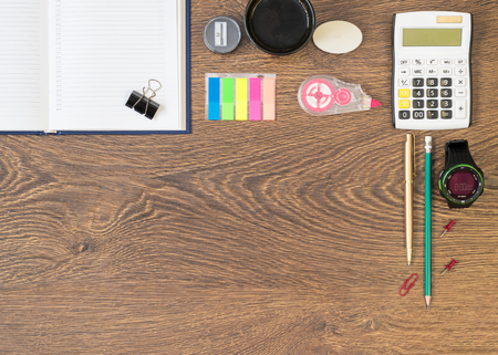 Accessories for the business in the workplace in the office. Office supplies on the table. Top view.の写真素材