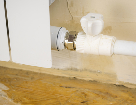 Damage to the heating system in a private home. Water leaks from the heating system.の写真素材