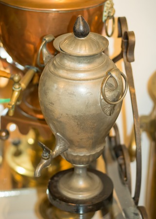 An ancient copper vessel for making tea. Brewing tea in Russia.の写真素材