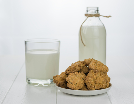 Bowl with homemade biscuits from flour and milk on a beautiful table. Diet organic Breakfast.の写真素材