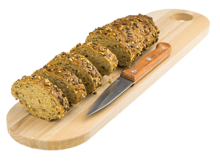 Freshly baked bread from wheat flour with sunflower seeds, pumpkin, sesame isolated on a white background. Baking for a healthy diet.の写真素材