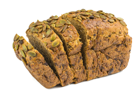 Freshly baked bread from wheat flour with sunflower seeds, pumpkin, sesame isolated on a white background. Baking for a healthy diet.の写真素材