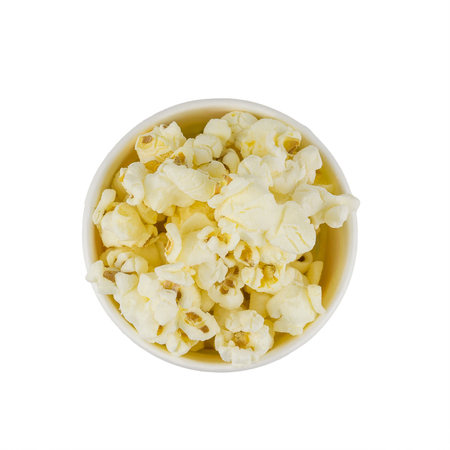 Popcorn in multi-colored festive glass isolated on a white background. The view from the top.の写真素材