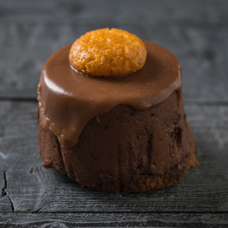 Cake on a dark wooden table. Delicious dessert on the rustic table.の写真素材