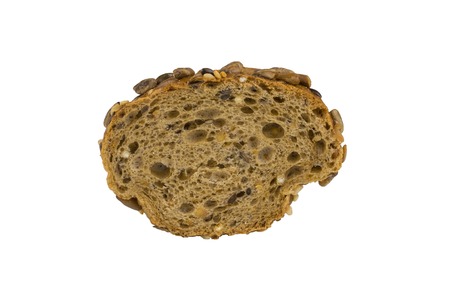 A piece of bread made of coarse flour isolated on white background. Homemade cakes from coarse flour...