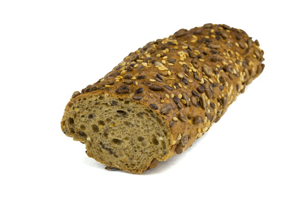 Large piece of bread made of coarse flour with cereals isolated on white background. Homemade cakes from coarse flour for diet.の写真素材