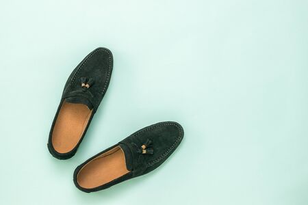 Stylish suede men's shoes on a light background. The view from the top.の写真素材