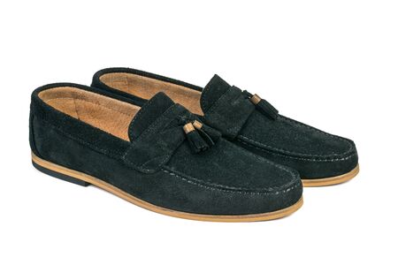 A pair of stylish men's loafers isolated on a white background. Fashionable men's shoes. The view from the top.の写真素材