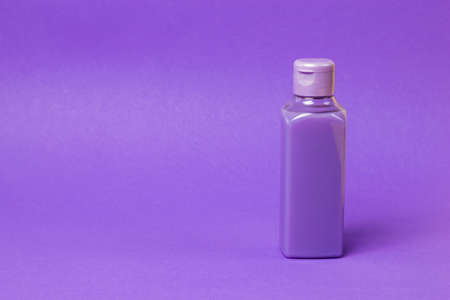 Set of colorful plastic bottles on a light background. Cosmetic product in a plastic bottle.の写真素材