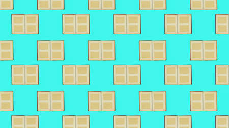 Seamless pattern of open old photo albums on a turquoise background. Flat lay.の写真素材
