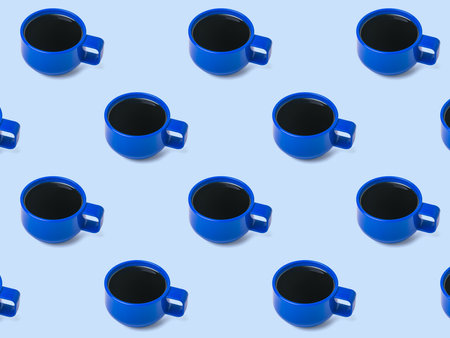 Seamless pattern of blue coffee cups with black coffee. A popular invigorating drink.の写真素材