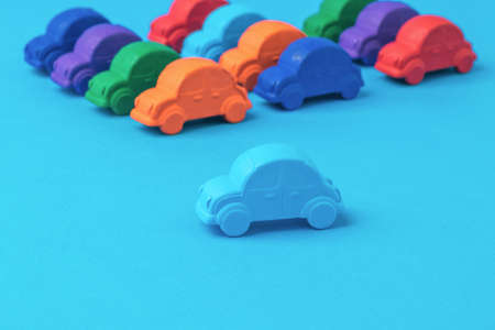 Installation of multi-colored cars displayed for sale. The concept of selling and buying cars.の写真素材