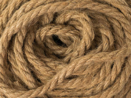 The background is made of coiled coarse twisted rope. Material for binding various products.
