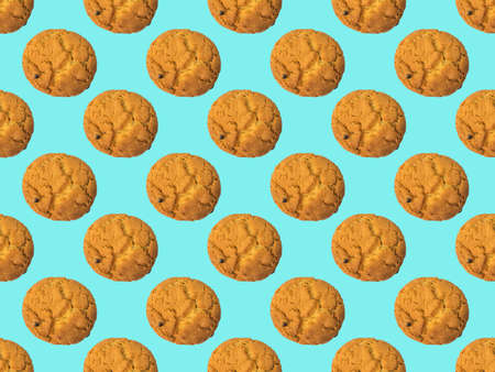 A seamless pattern of fresh cookies with chocolate chips. Sweet homemade cakes.の写真素材