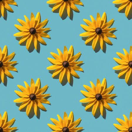 Yellow flowers on a blue background. Seamless pattern. Floral background.の写真素材