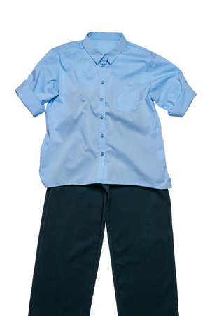 Blue shirt and dark pants isolated on a white background. Classic clothing.の写真素材