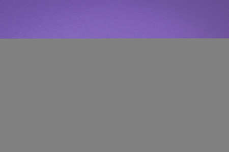 A yellow power cord plugged into a yellow outlet on a purple background. Stylish design. The place...