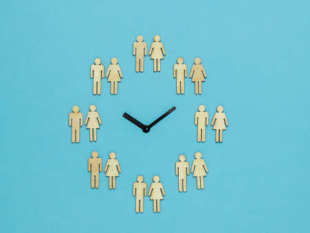 Creative watches made of male and female figures divided into pairs. The concept of periodic...