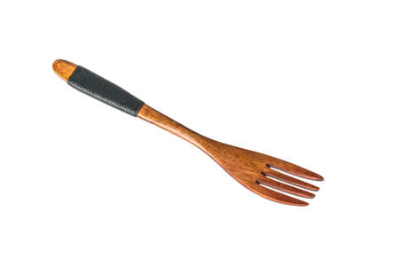 Vintage wooden fork with rope on the handle insulated on a white background. Stylish kitchen accessory.の写真素材