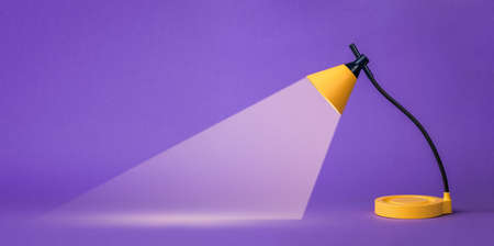 Yellow table lamp with a beam of light on a purple background. Minimal business concept. Ray embodying the idea.の写真素材