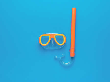 A set of swimming mask and snorkel on a blue background. Minimal concept of summer recreation and scuba diving. flat lay.の写真素材