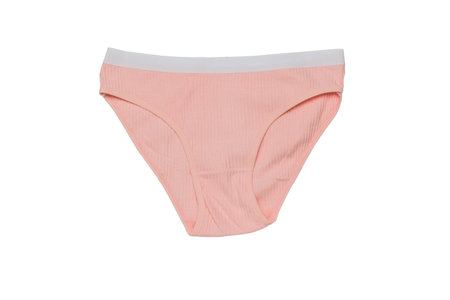 Light pink panties isolated on a white background. Minimal concept of women's underwear. flat lay.の写真素材