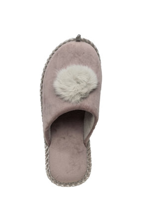 Beige slipper with fur trim isolated on a white background. Minimal concept of home shoes.の写真素材