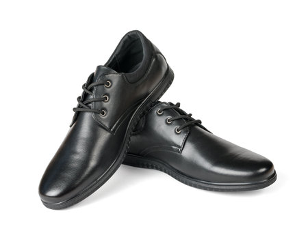 A pair of black men's elegant leather shoes isolated on a white background. Men's shoes.の写真素材