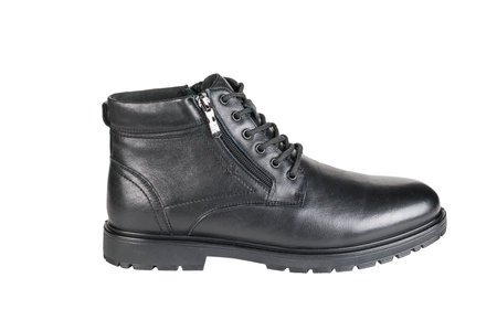 Leather black men's shoe isolated on a white background. The concept of warm winter shoes.の写真素材