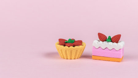 Two types of cakes on a pink background. A treat for dessert.の写真素材