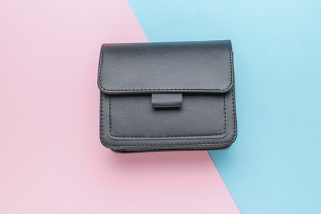 Minimalist Black Leather Wallet on Pink and Blue Background - Modern Accessories Designの写真素材