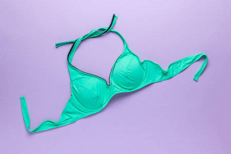 Teal Halter Bikini Top on Purple Background - Swimwear Fashion and Beachwear Trendsの写真素材