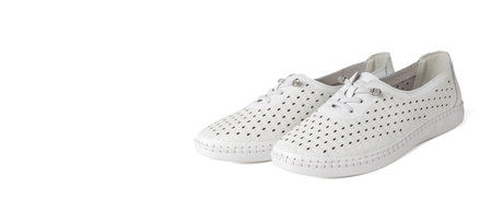 Comfortable White Women's Perforated Slip-On Casual Shoes for Summerの写真素材