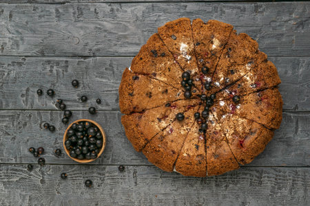Rustic Blackberry Cake on Wooden Table with Fresh Berriesの写真素材