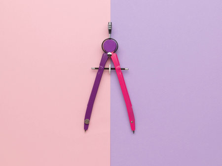 Colorful Compass on Pink and Purple Background - Creative Minimalist Design Photoの写真素材