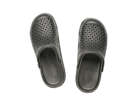 Top View of Black Perforated Clogs on White Background - Comfortable Footwear for Casual Wearの写真素材