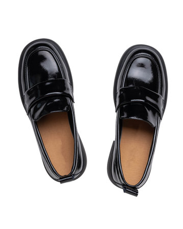 Shiny Black Patent Leather Loafers Top View Classic and Elegant Footwear for Men and Womenの写真素材