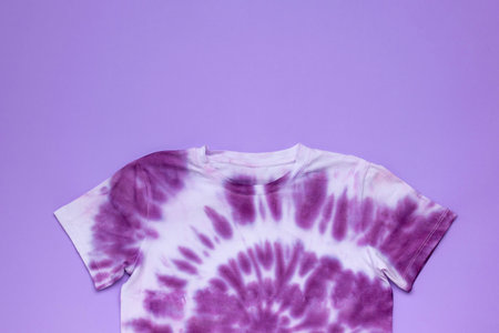 Purple Tie-Dye T-Shirt on Lavender Background - Trendy Fashion Apparelの写真素材