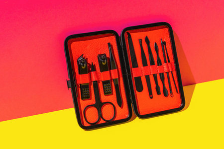 Manicure Set on Vibrant Background - Nail Care Tools and Accessories Displayの写真素材