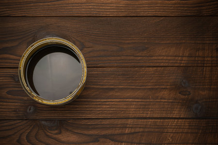 Open Paint Can on Rustic Wooden Surface Artistic, DIY, Home Improvement, Renovation, Toolの写真素材