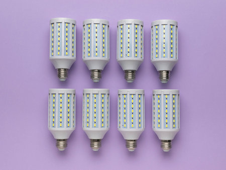 Energy-Efficient LED Bulbs on Purple Background: Modern Lighting Solutionsの写真素材