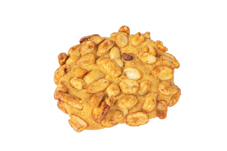 Crunchy Peanut Cookie with Savory Nuts and Golden Brown Texture on White Backgroundの写真素材