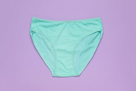 Mint Green Women's Underwear on Lilac Background - Stock Photo for Fashion and Apparelの写真素材